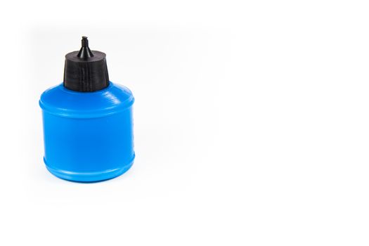 plastic blue  glue container isolated on white