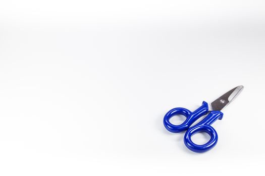 Typical electrical used scissors with blue arms