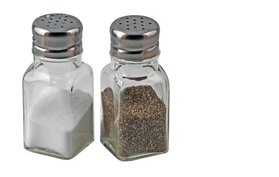 Common salt and pepper shakers isolated on a white background with a clipping path.