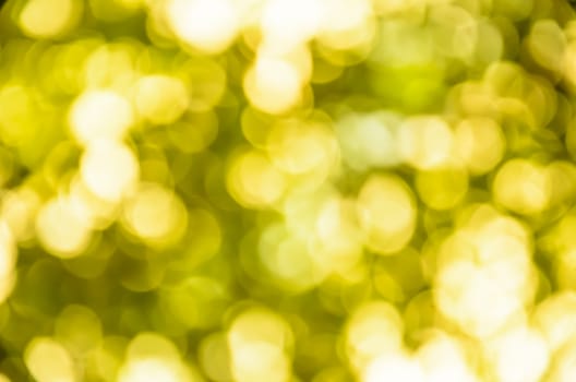 Light blur and bokeh yellow color background