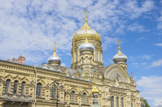 beautiful Christian church in St. Petersburg with golden domes and crosses