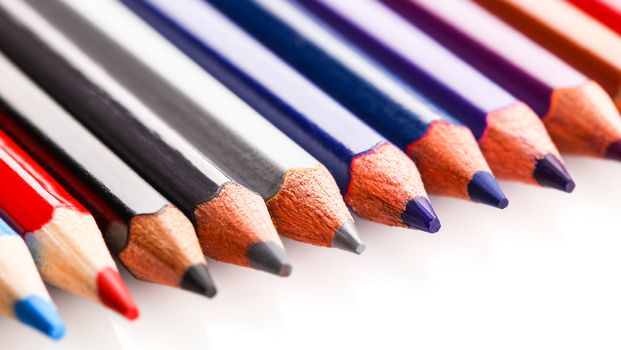 colored pencils close-up while lying in a row