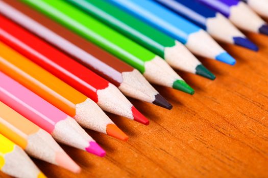 colored pencils close-up while lying in a row