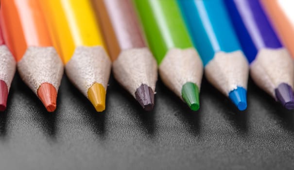 colored pencils close-up while lying in a row