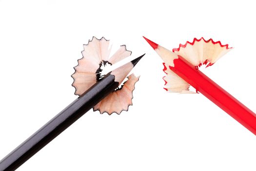 red and black pencil on a white background