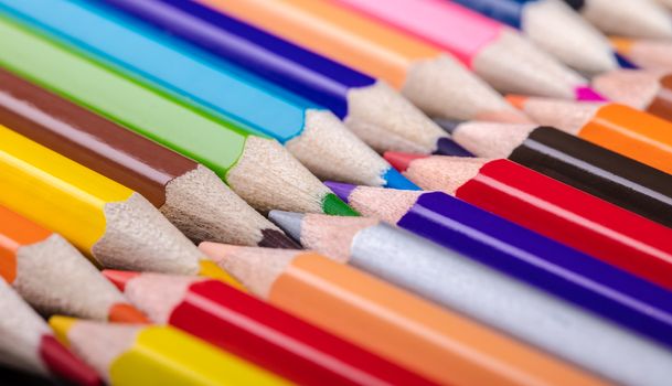 colored pencils close-up while lying in a row