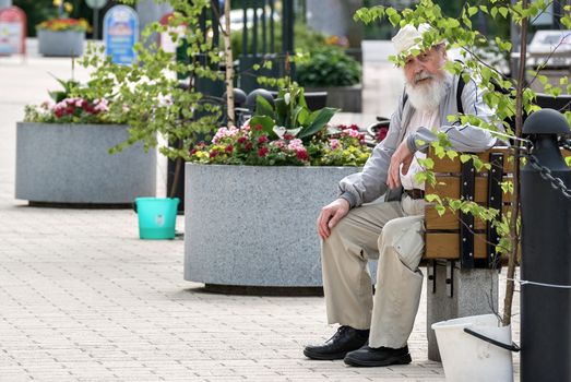 IMATRA, FINLAND, June 24: The old man has a rest, sitting on a bench on a hot summer day in the streets of the Finnish town of Imatra, 24 June 2016.