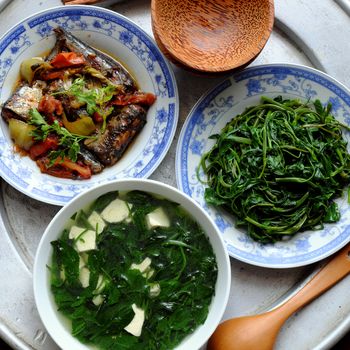 Vietnamese food, fish sauce, boiled vegetable and vegetables soup.Dinner time is family meal and happy time, a traditional culture