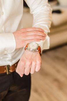 wedding groom suit, white shirt, brown pants, watch