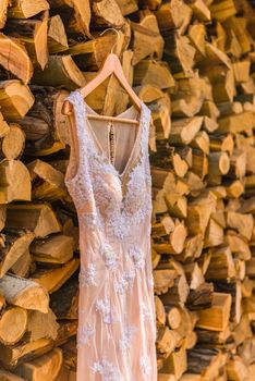 wedding dress on the tree on wood background