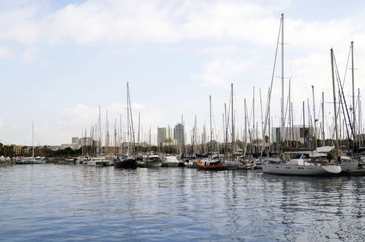  BARCELONA, SPAIN - OCTOBER 09, 2015: Yachts parked at Port Vell in Barcelona, Spain