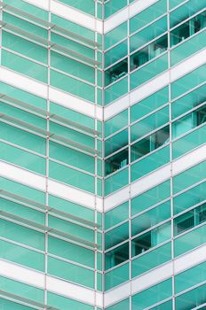 Green and white modern office building detail