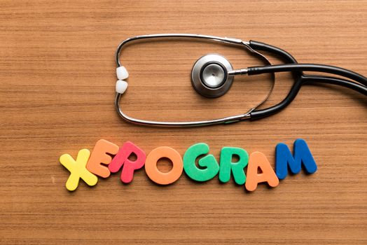 xerogram colorful word with stethoscope on wooden background