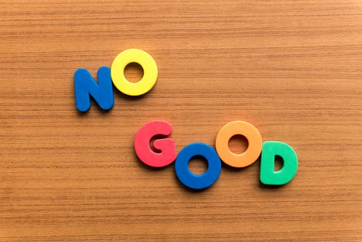 no good colorful word on the wooden background