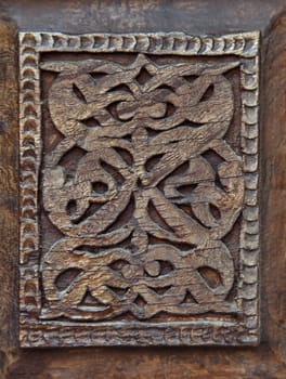 Close-up of a traditional carved wooden door, Uzbekistan