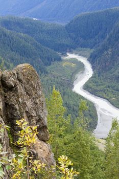 Distant view of winding Salmon River in British Columbia from glacier summit viewpoint on Granduc Mine Road. Location is north of Hyder, Alaska, USA, and Stewart, British Columbia on Canadian side of border.  Date taken is September, 2015.  