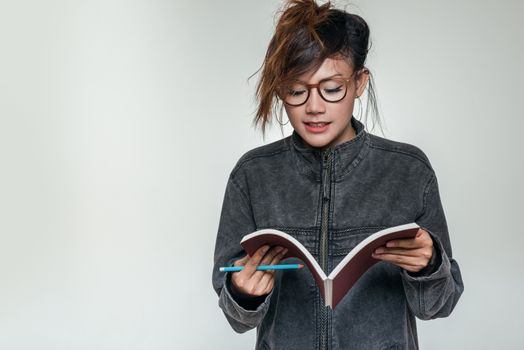 Asian women have enjoyed reading a book.