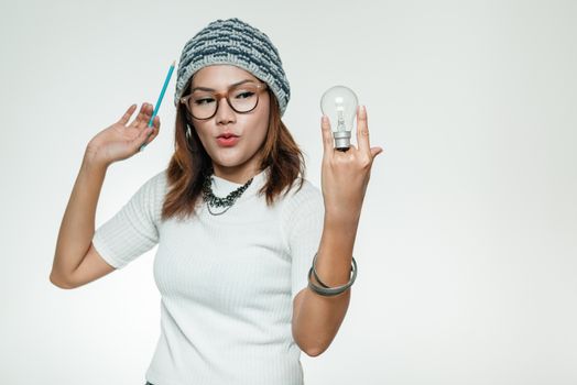 Asian woman with a light bulb idea emotionally.