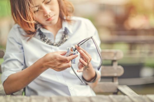 Asian women are cleaning glasses,Focus on hands