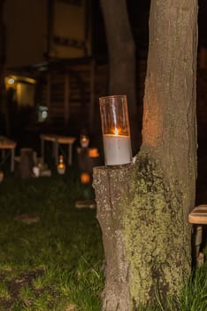 wedding decor, candles on the cut stumps