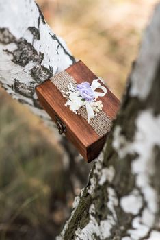 box for wedding rings between the birches