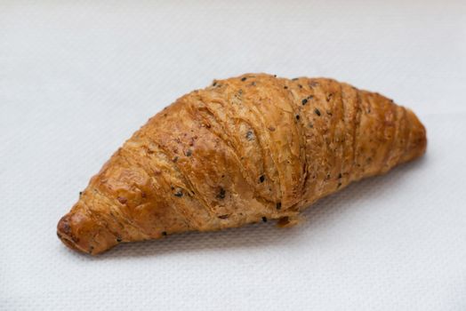 Photo Croissant on white paper.