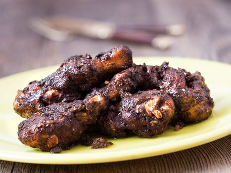 close up of spicy jamaican jerk chicken