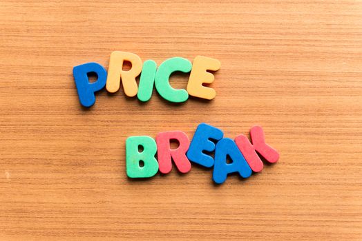 price break colorful word on the wooden background