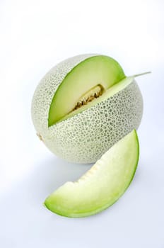 shopped green melon isolated on white background