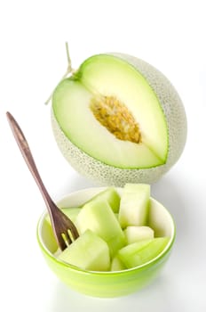shopped green melon isolated on white background
