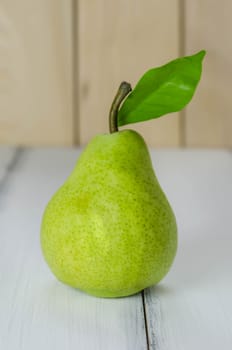 Fresh pears on the wooden background. Still life