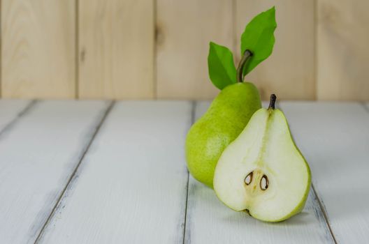 Fresh pears on the wooden background , Free space for text