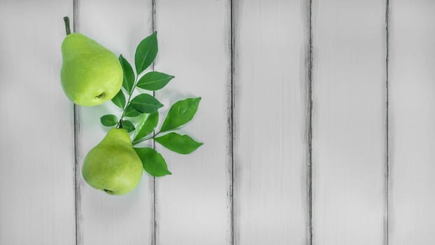 top view fresh pears on the wooden background, Free space for text