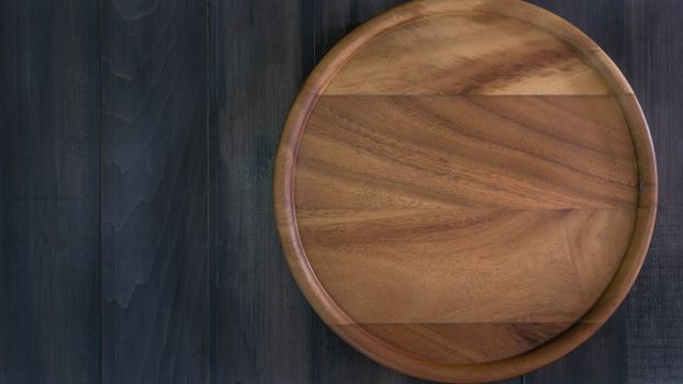 top view of wood cutlery on wooden background , Free space for text