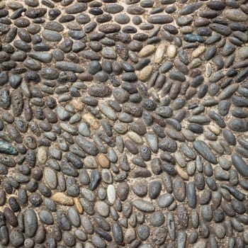 Background or texture of a cobblestone pavement