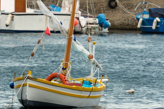 Sicily - Italy. The sailboat anchored in the harbor.