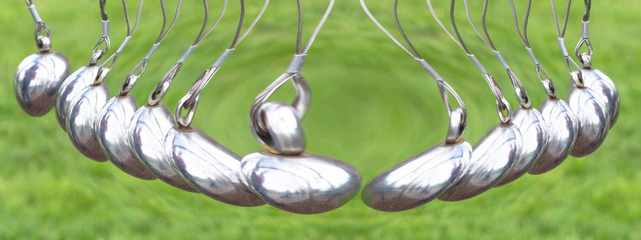 Newton's Cradle or pendulum ball, Newton pendulum also called Newton's cradle.
Physics is action, reaction and concept or cause and effect.
