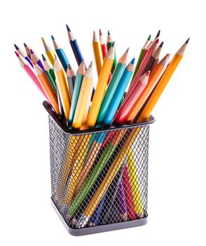 basket with colored pencils on white background
