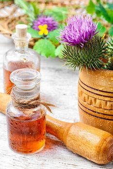 Glass vial with therapeutic drug of the flowering milk Thistle