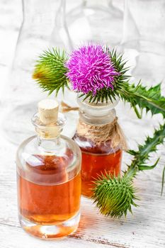 Glass vial with therapeutic drug of the flowering milk Thistle