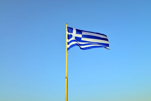 greece country pole flag over blue sky