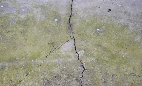 Crack in the concrete floor. Danger of texture.