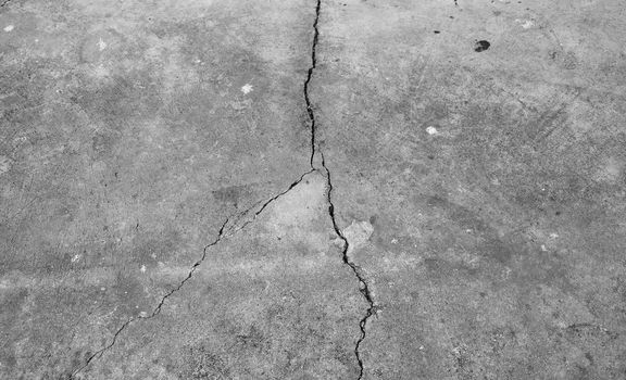 Crack in the concrete floor. Danger of texture.