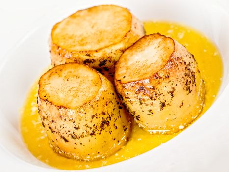 close up of golden fondant potato