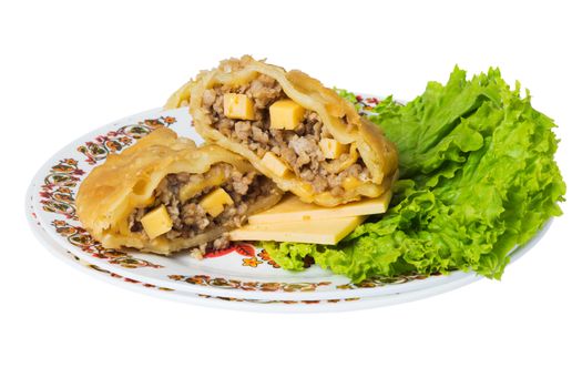 Caucasian pie stuffed with meat  and cheese (cheburek) on plate, isolated