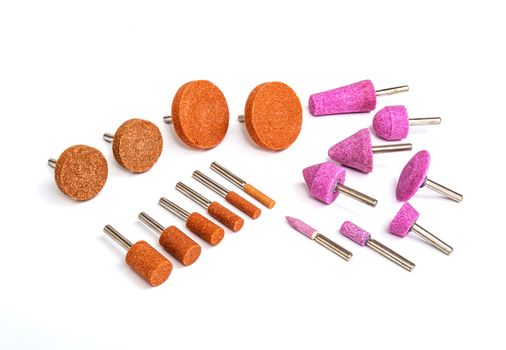 Grinding and polishing bits set on white background