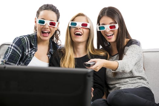 Girls watching 3D movies with popcorn