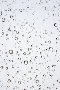 Abstract background. Drops of water on the window. Shallow DOF