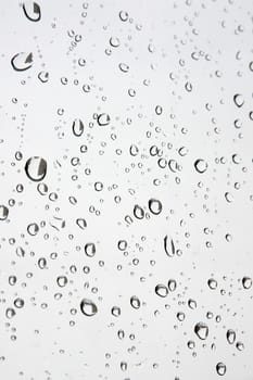 Abstract background. Drops of water on the window. Shallow DOF