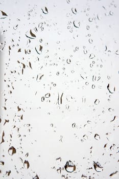 Abstract background. Drops of water on the window. Shallow DOF